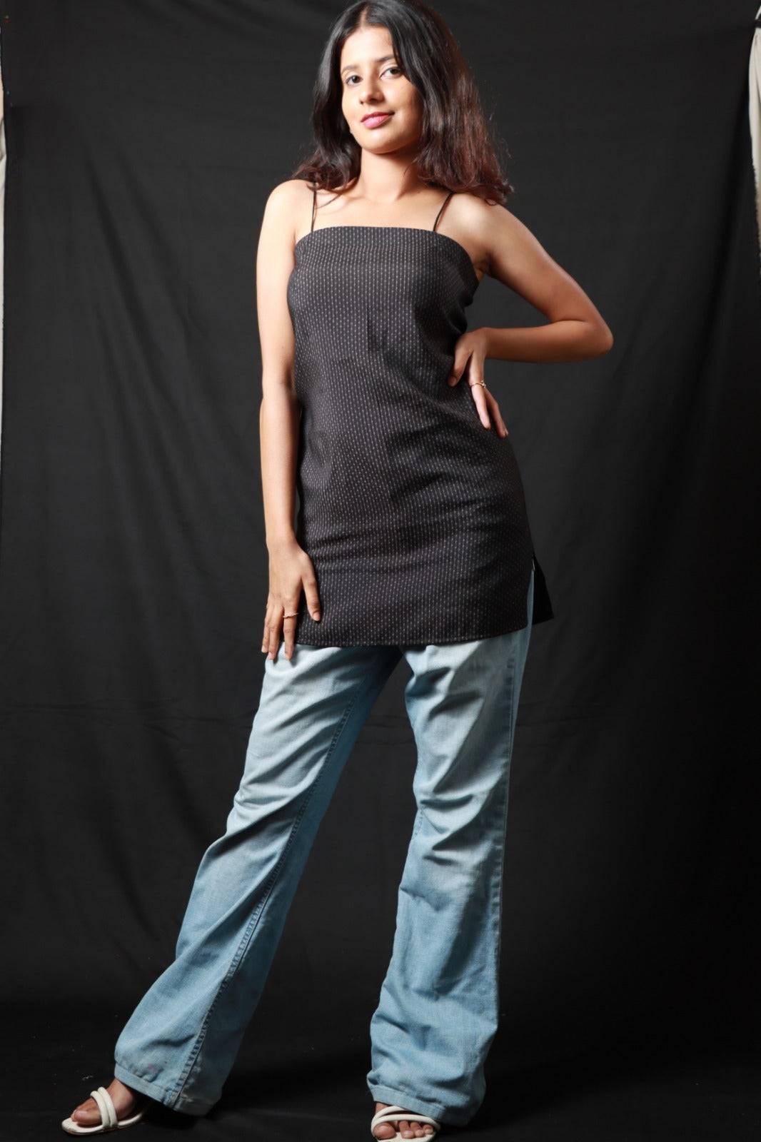 dark coloured spaghetti-strap top with