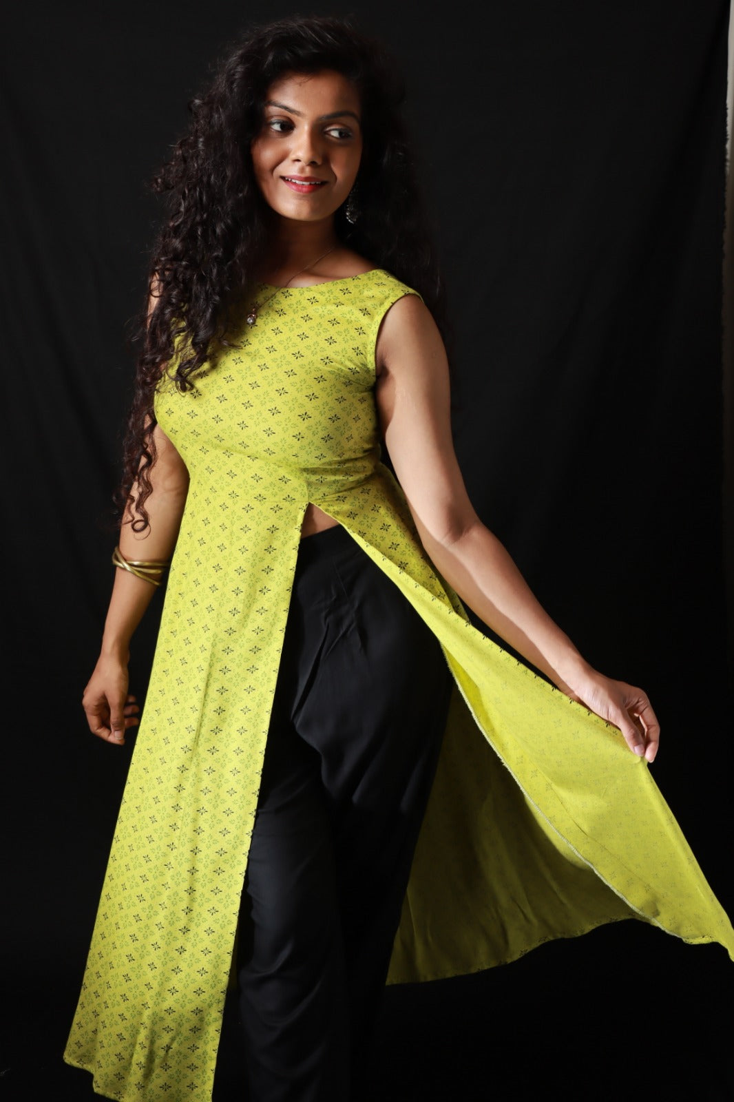 Yellow sleeveless kurthi with front slit & black pants