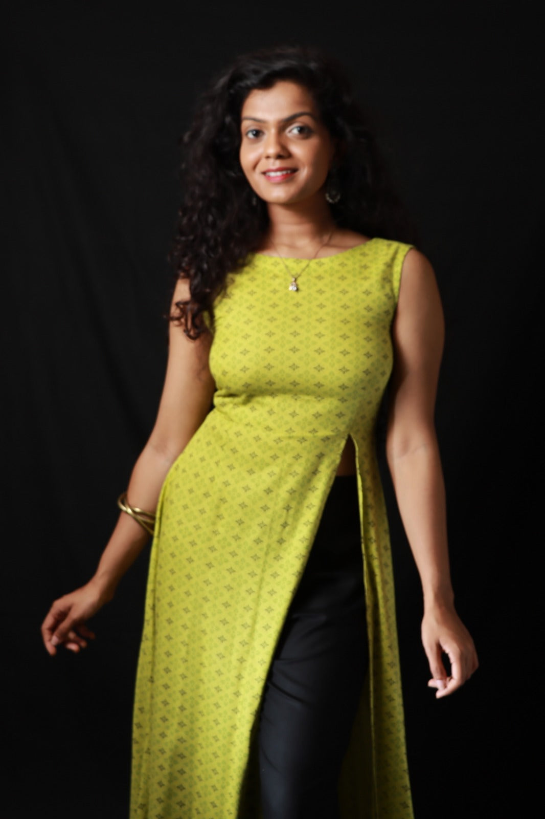 Yellow sleeveless kurthi with front slit & black pants